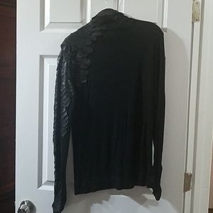 Black turtleneck with faux leather detailing